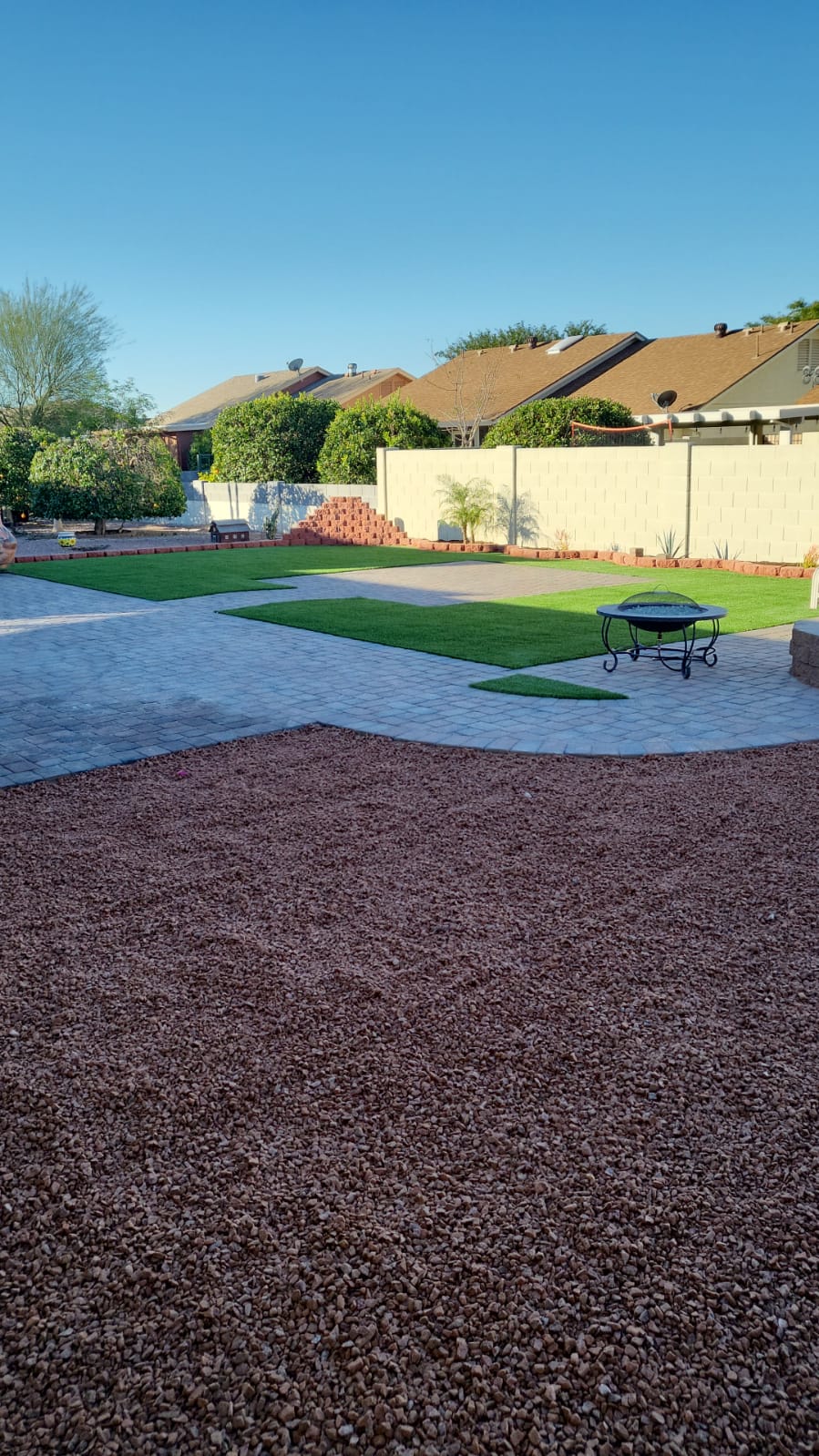 Paver, turf and gravel installation.